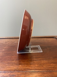 A Chinese monochrome copper-red dish, Qianlong mark and of the period