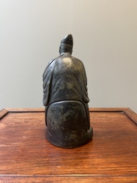A Chinese monochrome black-glazed figure of Ji Gong, 18th C.