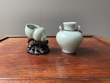 A Chinese celadon-glazed water pot on wooden stand and a small 'hu' vase, 19/20th C.