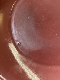 A Chinese monochrome copper-red dish, Qianlong mark and of the period