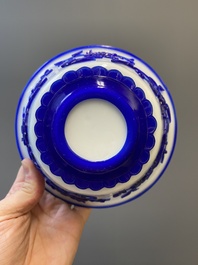 A Chinese overlay Beijing glass 'magpie and plum blossom' bowl in blue on white, 19th C.