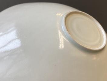 A Chinese qingbai-glazed 'phoenixes' bowl and a cream-glazed 'fish' bowl, probably Song