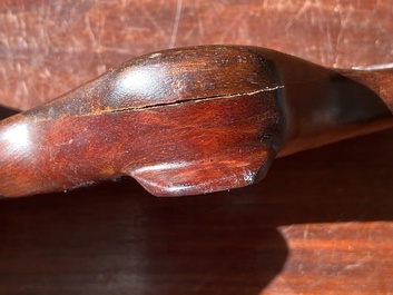A Chinese grey lingbi stone scholar's rock on wooden stand, 19/20th C.