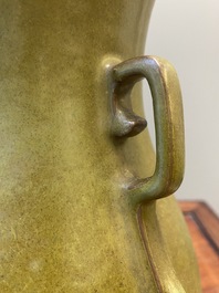 A Chinese monochrome teadust-glazed 'hu' vase, Qianlong mark, 19/20th C.