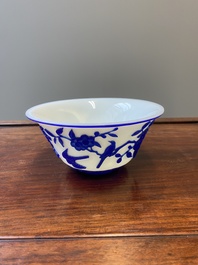 A Chinese overlay Beijing glass 'magpie and plum blossom' bowl in blue on white, 19th C.