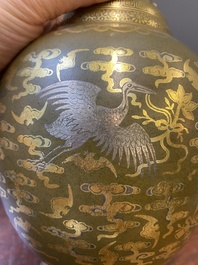 A Chinese gilt- and silver-decorated teadust-glazed vase with bats and cranes among clouds, Qianlong mark, Republic