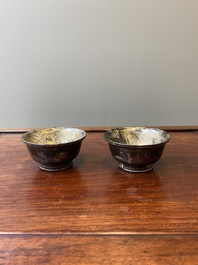 Two Chinese lac-burgaut&eacute; bowls with silvered interiors, Kangxi