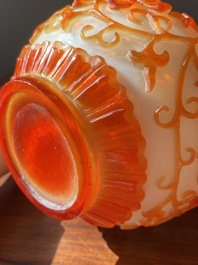 A Chinese overlay Beijing glass bottle vase with lotus scrolls in yellow on white, 19t/20h C.
