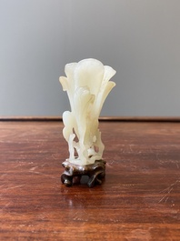 A Chinese white jade 'magnolia' carving, Qing