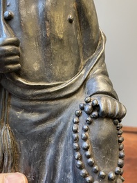 A Chinese monochrome black-glazed figure of Ji Gong, 18th C.