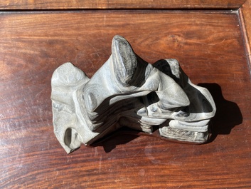 A Chinese grey lingbi stone scholar's rock on wooden stand, 19/20th C.