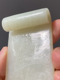 Two fine Chinese white and celadon jade brush rests, Qing