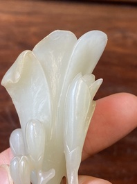 A Chinese white jade 'magnolia' carving, Qing