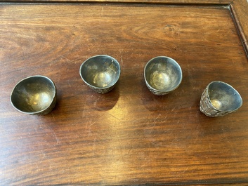 Four Chinese silver-lined coconut cups, Wang Hengxin 王恒馨 mark, 19/20th C.