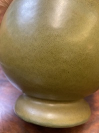 A Chinese monochrome teadust-glazed 'hu' vase, Qianlong mark, 19/20th C.