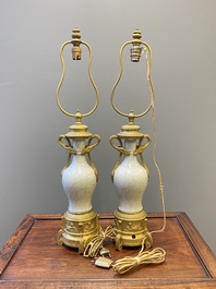 A pair of Chinese gilt bronze lamp-mounted crackle-glazed vases, 18/19th C.
