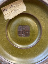 A Chinese monochrome teadust-glazed 'hu' vase, Qianlong mark, 19/20th C.