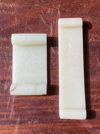 Two fine Chinese white and celadon jade brush rests, Qing