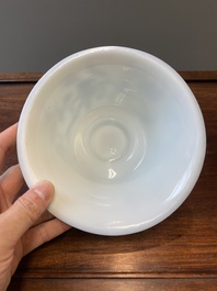 A Chinese overlay Beijing glass 'magpie and plum blossom' bowl in blue on white, 19th C.