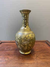 A Chinese gilt- and silver-decorated teadust-glazed vase with bats and cranes among clouds, Qianlong mark, Republic
