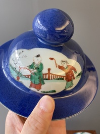 A pair of Chinese powder-blue-ground famille verte vases and covers, 19th C.