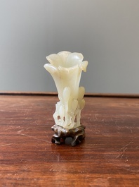 A Chinese white jade 'magnolia' carving, Qing