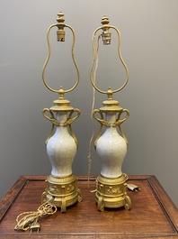 A pair of Chinese gilt bronze lamp-mounted crackle-glazed vases, 18/19th C.