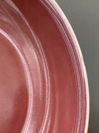 A Chinese monochrome copper-red dish, Qianlong mark and of the period