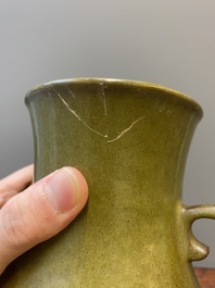 A Chinese monochrome teadust-glazed 'hu' vase, Qianlong mark, 19/20th C.