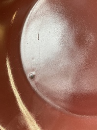 A Chinese monochrome copper-red dish, Qianlong mark and of the period
