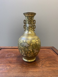 A Chinese gilt- and silver-decorated teadust-glazed vase with bats and cranes among clouds, Qianlong mark, Republic