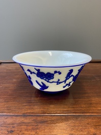 A Chinese overlay Beijing glass 'magpie and plum blossom' bowl in blue on white, 19th C.