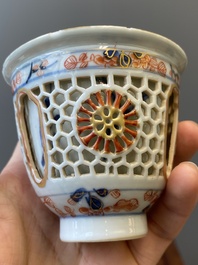 A Chinese Imari-style double-walled reticulated cup and a grisaille and gilt cup, Kangxi/Qianlong