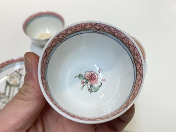 A pair of Chinese famille rose cups and saucers with a lady and a boy, Yongzheng