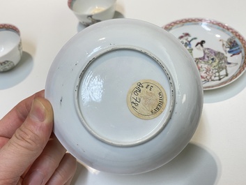 A pair of Chinese famille rose cups and saucers with a lady and a boy, Yongzheng