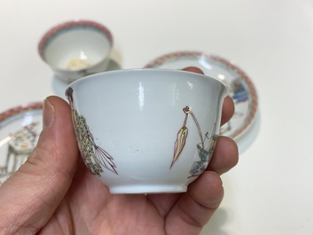 A pair of Chinese famille rose cups and saucers with a lady and a boy, Yongzheng