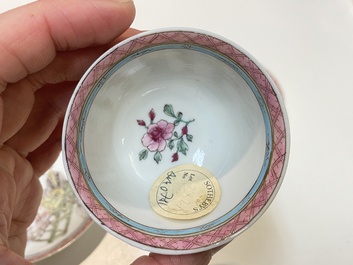 A pair of Chinese famille rose cups and saucers with a lady and a boy, Yongzheng