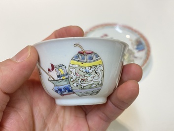 A pair of Chinese famille rose cups and saucers with a lady and a boy, Yongzheng
