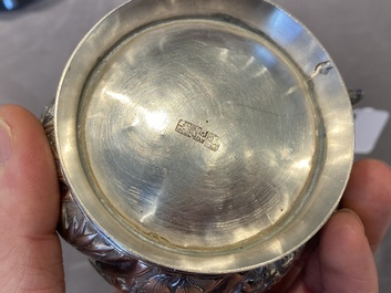 A Chinese four-piece silver tea set, Jiu Jiang Qing He Huan 九江 慶和 煥 mark, 19th C.