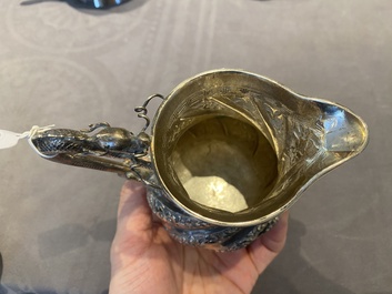 A Chinese four-piece silver tea set, Jiu Jiang Qing He Huan 九江 慶和 煥 mark, 19th C.