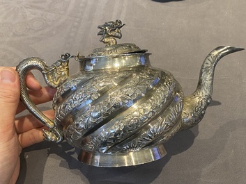 A Chinese four-piece silver tea set, Jiu Jiang Qing He Huan 九江 慶和 煥 mark, 19th C.