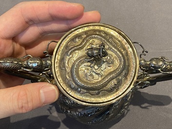 A Chinese four-piece silver tea set, Jiu Jiang Qing He Huan 九江 慶和 煥 mark, 19th C.