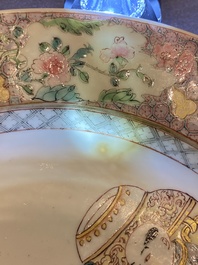 A pair of fine Chinese famille rose plates with a lady and two boys, Yongzheng