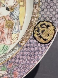 A pair of fine Chinese famille rose plates with a lady and two boys, Yongzheng
