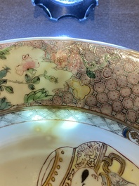A pair of fine Chinese famille rose plates with a lady and two boys, Yongzheng