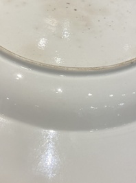 A pair of fine Chinese famille rose plates with a lady and two boys, Yongzheng