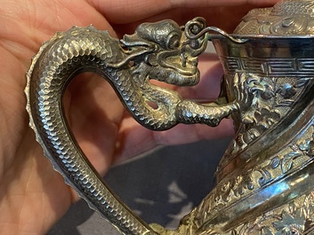 A Chinese four-piece silver tea set, Jiu Jiang Qing He Huan 九江 慶和 煥 mark, 19th C.