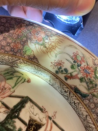 A pair of fine Chinese famille rose plates with a lady and two boys, Yongzheng