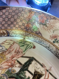 A pair of fine Chinese famille rose plates with a lady and two boys, Yongzheng