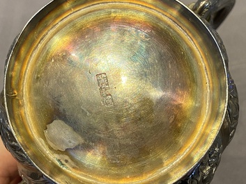 A Chinese four-piece silver tea set, Jiu Jiang Qing He Huan 九江 慶和 煥 mark, 19th C.